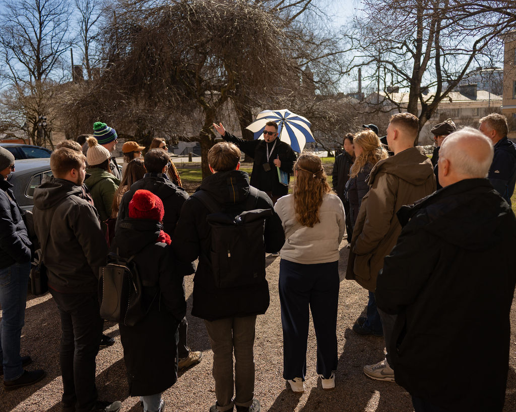 Guide leading a walking tour